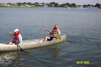 Racers in their boat